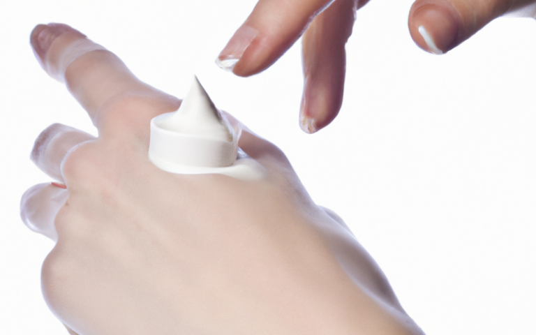 Sunscreen lotion on the back of hand.