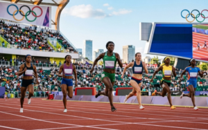 Women sprinters race.